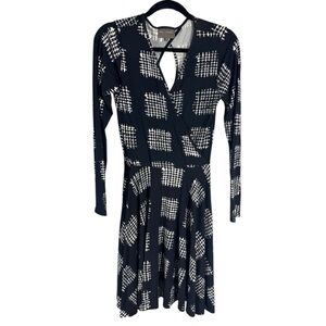 Bel Kazan stretchy skater dress with keyhole cutout in back.  Size small